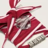 Skins red and white striped laces with charms