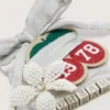 Skins silver laces with charm and appliqués