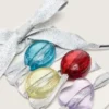 Skins silver laces with four colorful charms
