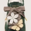 Skins "Sparkling" brown, black and silver herringbone laces with two appliqué charms
