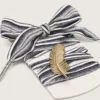 Skins striped laces with gold feather charm