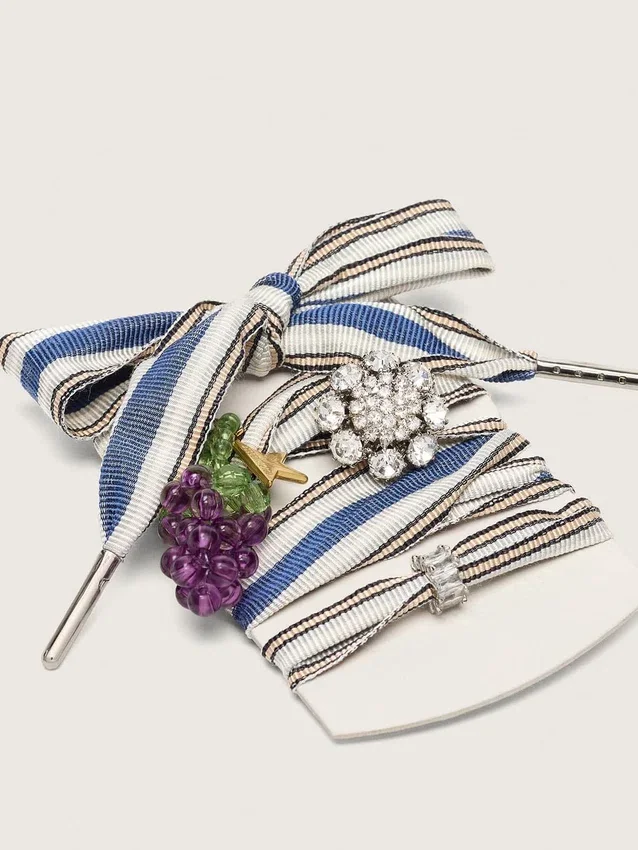 Skins striped laces with grape and crystal charms
