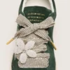 Skins "Vintage" white and beige striped laces with flower-shaped charm