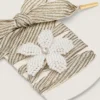 Skins "Vintage" white and beige striped laces with flower-shaped charm