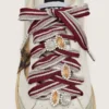 Skins white and burgundy striped laces embellished with charms