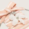 Skins white and pink striped laces with beaded and crystal charms