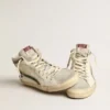 Slide in beige nappa with green laminated leather star and flash