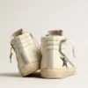 Slide in beige nappa with green laminated leather star and flash