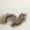 Slide in midnight-blue denim with white leather star