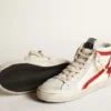 Slide with a red laminated leather star and flash
