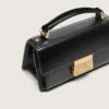 Small Venezia Bag in black boarded leather with gold details
