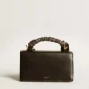 Small Venezia Bag in black boarded leather with silk scarf