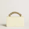Small Venezia Bag in butter-colored boarded leather with braided scarf