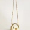 Small Venezia Bag in butter-colored boarded leather with braided scarf and double charm
