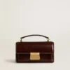 Small Venezia Bag in dark brown laminated leather with gold details