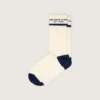 Socks in worn white with turn-up and dark blue details