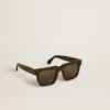 Square-style Jamie sunglasses with black frame and gold logo