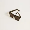 Square-style Jamie sunglasses with black frame and gold logo