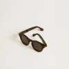 Square style Panthos sunglasses with black frame and lenses