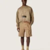 Khaki-colored socks with distressed details and dark green and white stripes