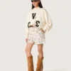 Star unisex cotton sweatshirt in vintage white with VCE embroidered patches