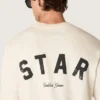 Star unisex cotton T-shirt in vintage white with black print on the back