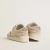 Stardan in cream-colored suede and leather with Swarovski and a suede star
