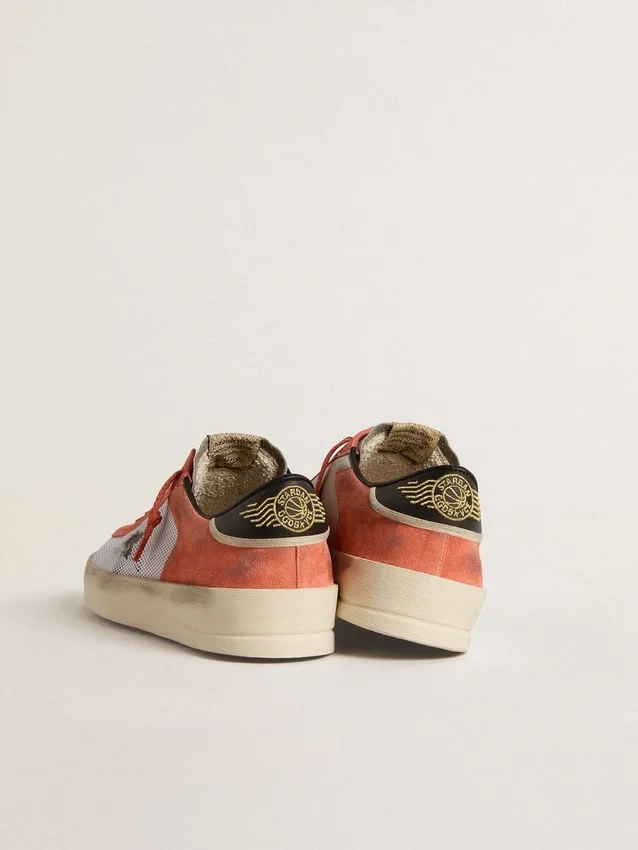 Stardan LTD in coral-colored suede and mesh with black leather star