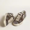 Super-Star in glitter with a brown star and lilac heel tab