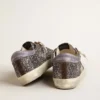 Super-Star in glitter with a brown star and lilac heel tab