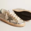 Super-Star in gray canvas with a green leather star and heel tab