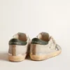 Super-Star in gray canvas with a green leather star and heel tab
