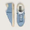 Super-Star in light blue suede with beige leather star and heel tab