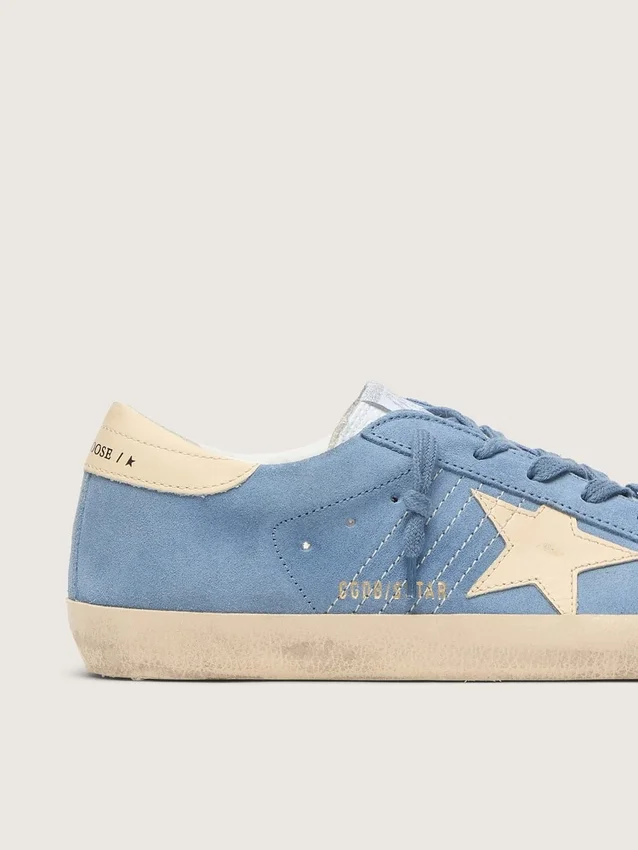Super-Star in light blue suede with beige leather star and heel tab