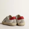 Super-Star Junior with suede star and red leather heel tab