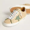 Super-Star LTD in beige leather with green suede star and silver foiled leather heel tab