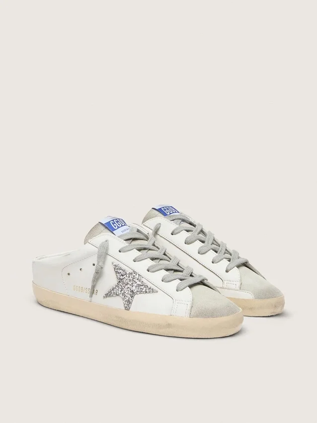 Super-Star Sabot with a platinum glitter star and suede tongue