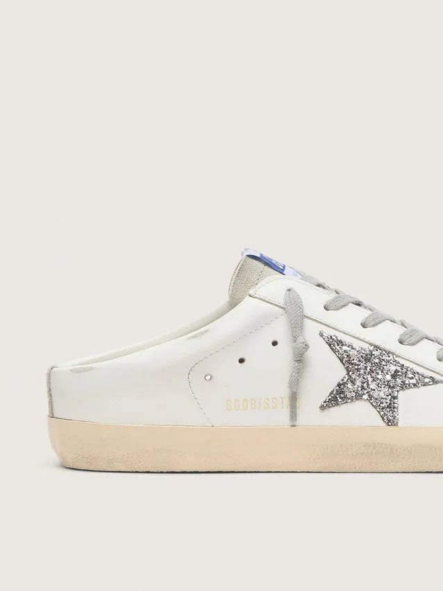 Super-Star Sabot with a platinum glitter star and suede tongue
