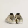 Super-Star Sabots in platinum foiled leather with beige suede star
