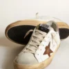 Super-Star with a tan star and pink glitter heel tab