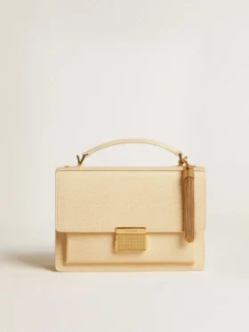 Tassel-shaped charm in antique gold-colored brass