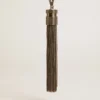 Tassel-shaped charm in silver-colored brass with crystals