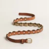 Trinidad belt in aged tan-colored leather with golden maxi studs