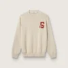 Unisex crew-neck sweater in beige cotton with patch on the front and logo on the back