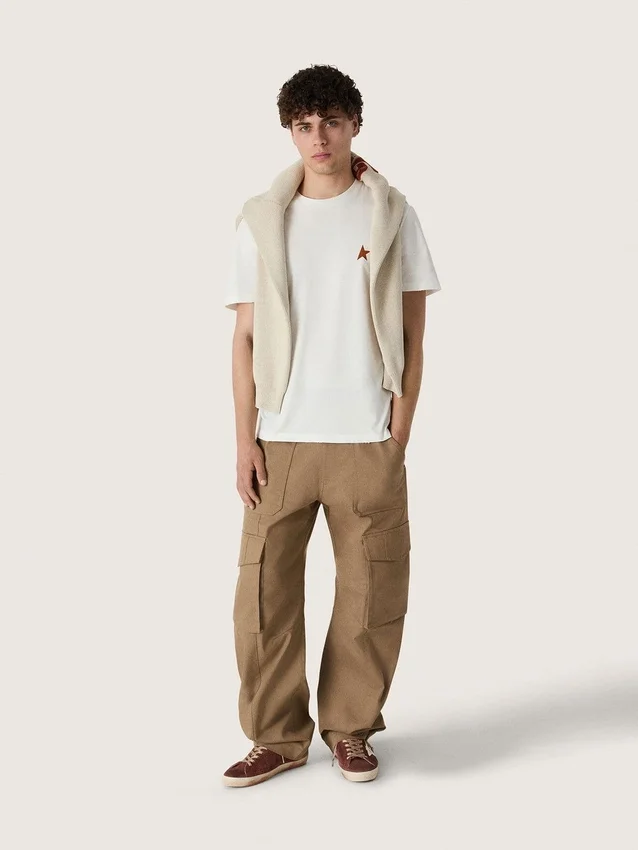 Unisex crew-neck sweater in beige cotton with patch on the front and logo on the back