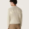 Unisex crew-neck sweater in beige cotton with patch on the front and logo on the back
