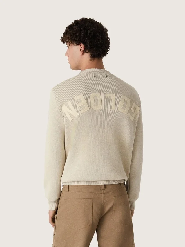 Unisex crew-neck sweater in beige cotton with patch on the front and logo on the back