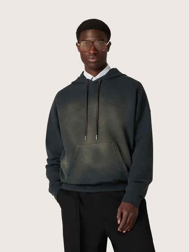 Unisex hooded sweatshirt in black cotton with a bleached effect