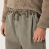 Unisex pants in gray denim with drawstring and star