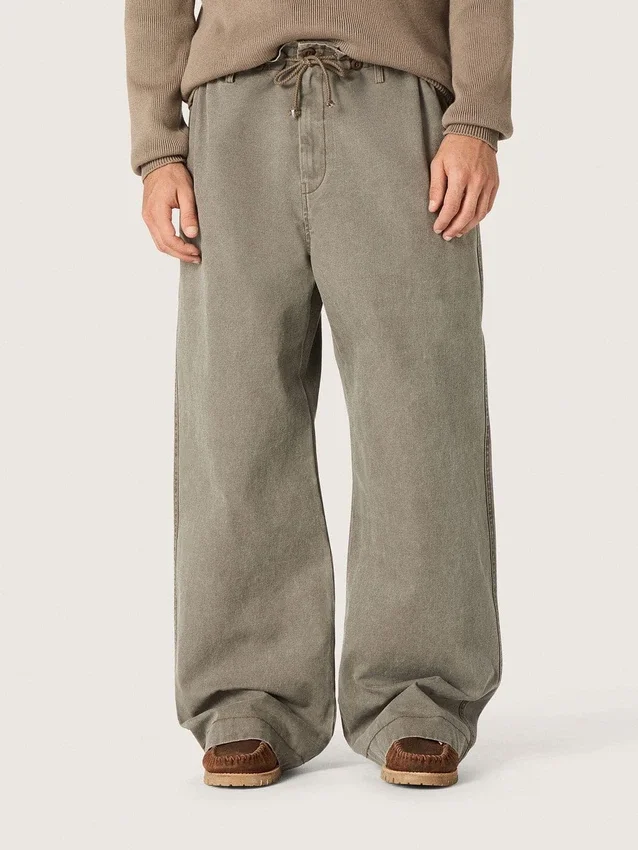 Unisex pants in gray denim with drawstring and star